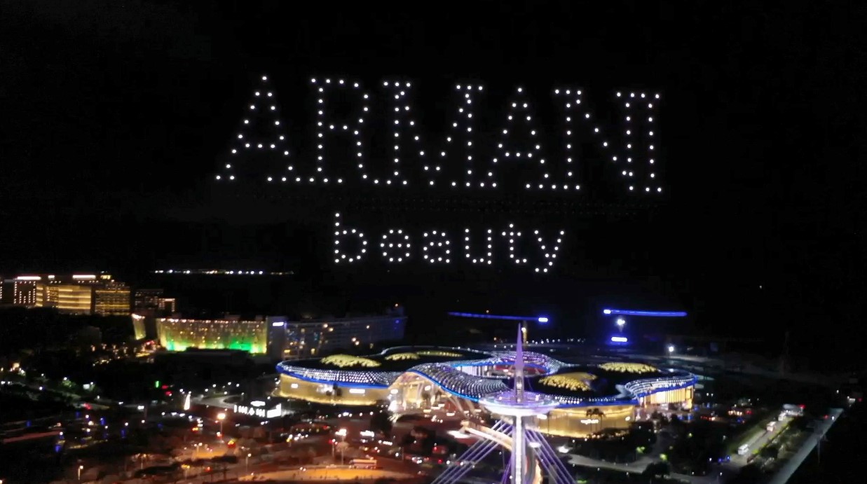 Drone light show still: Armani drone-and-fireworks show